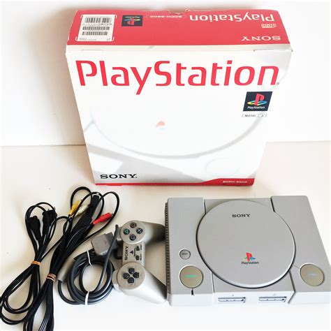 Playstation 1 console with game - www.disperse.cl