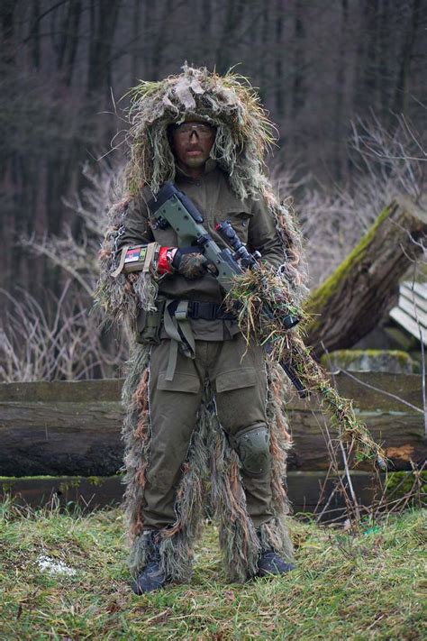 Sniper Soldier Covered With Grass Holding Sniper Rifle Military Image ...