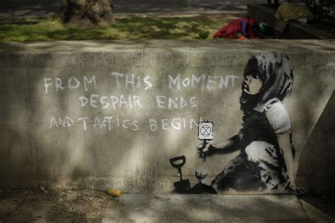 Climate mural emerges after London protests; Is it Banksy?