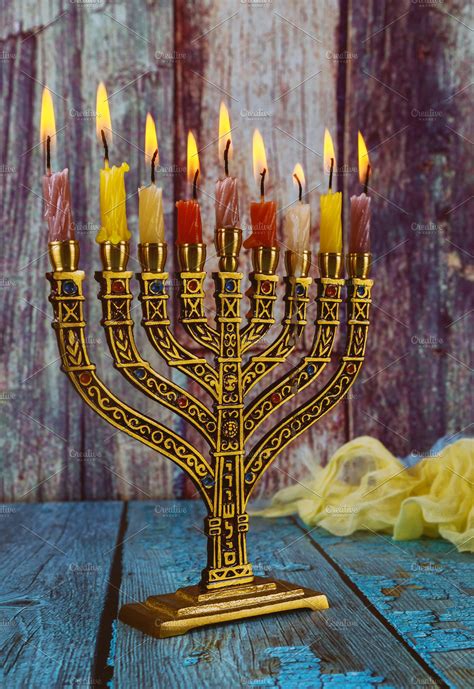 Hanukkah menorah with burning candle stock photo containing jewish ...