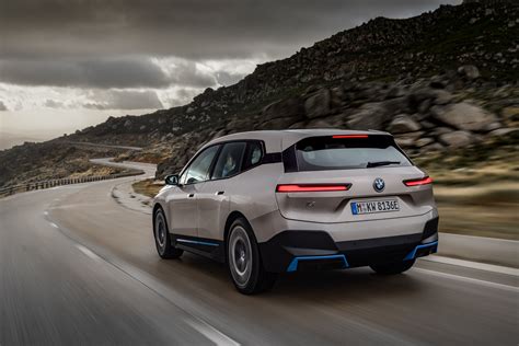 BMW launches its new flagship iX electric SUV with 300 miles of range ...