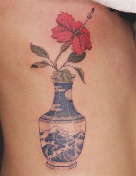 Hibiscus Tattoos: Meanings, Tattoo Styles & Ideas