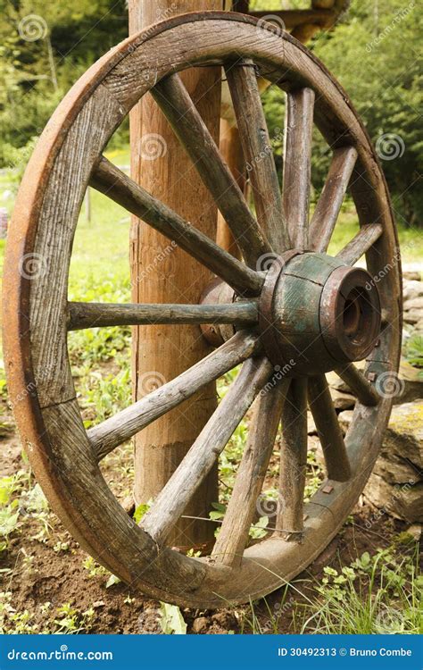 Old wooden wagon wheel stock image. Image of wheel, ancient - 30492313