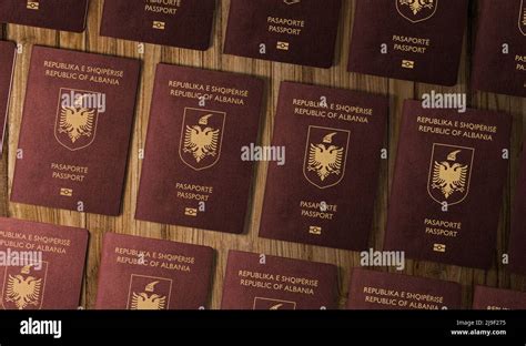 Passports of Albanian , top view, on a wooden table ,The Albanian ...