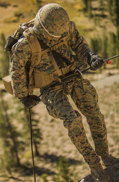 A U.S. Marine with Weapons | Free Photo - rawpixel