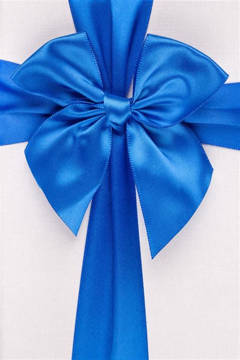 Blue ribbon with bow as gift on white background 11041514 Stock Photo ...