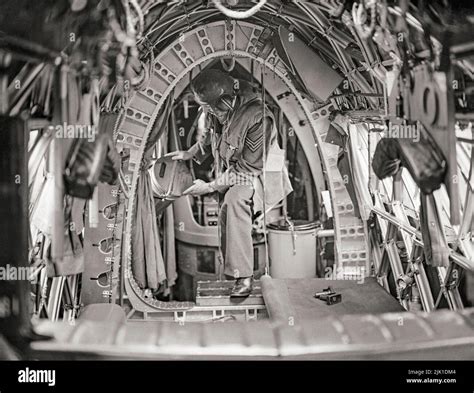 A crew member on board a Vickers Wellington of No. 75 (New Zealand ...