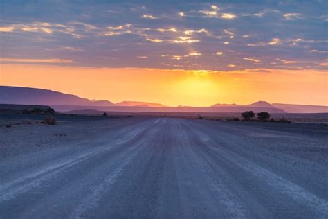 Premium Photo | Sunrise over the namib desert, roadtrip in the ...