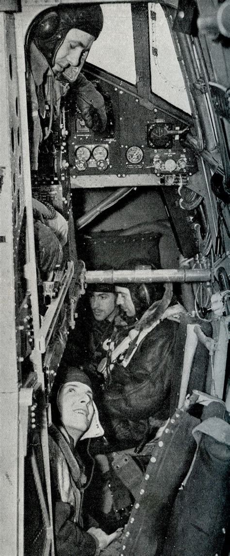 Halifax Bomber Crew. The pilot looks down at the radio operator ...