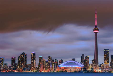 Toronto Skyline after sunset with clouds Photograph by Henk Meijer ...