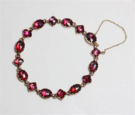 gold and garnet bracelet - Inez Stodel