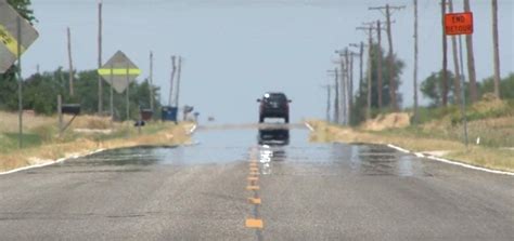 Why Do in Summers Roads Appear to be Covered in Water?