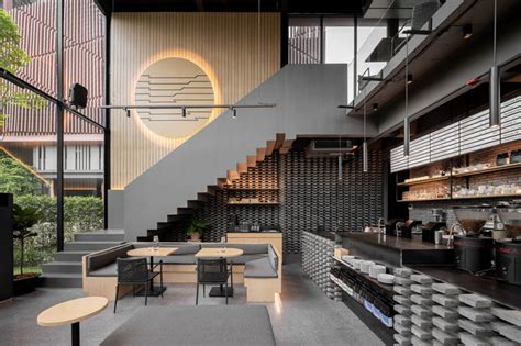 A Material Palette Of Warm Woods And Grey Elements Has Been Used To ...