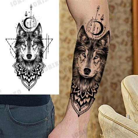 Details 84+ wolf and moon tattoo best - in.coedo.com.vn