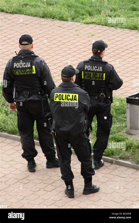 Three polish police officers on patrol Stock Photo - Alamy