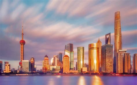 Download Modernized Hangzhou Skyline Buildings Wallpaper | Wallpapers.com