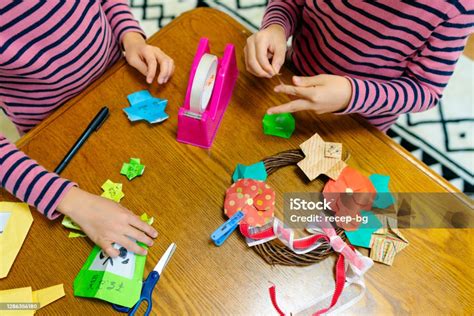 Two Brother Making Diy Japanese Traditional Oshogatsu Decorations At ...