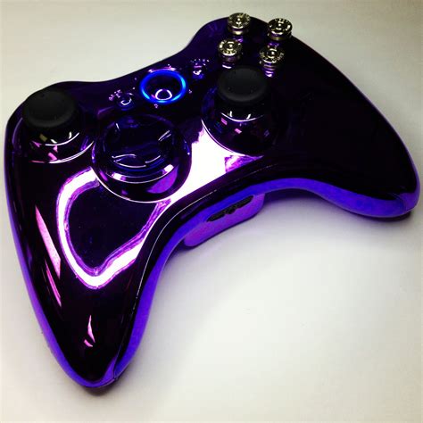 A purple chrome custom modded Xbox 360 controller with nickel bullet ...