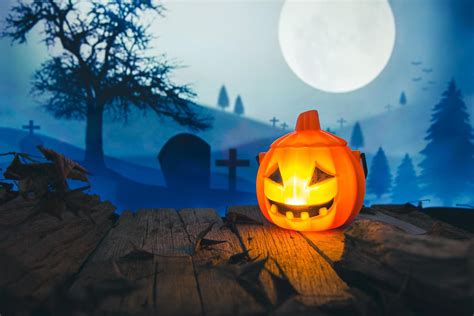 Spooky cemetery with glow halloween pumpkin 10266224 Stock Photo at ...