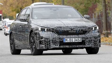 2023 BMW 5 Series Spied With Less Camouflage To Reveal Production Cues