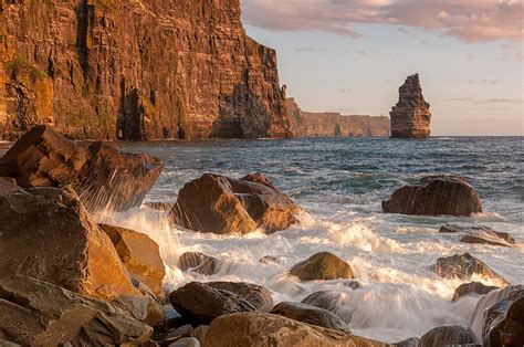 Cliffs of Moher sunset Photograph by Eugene Remizov