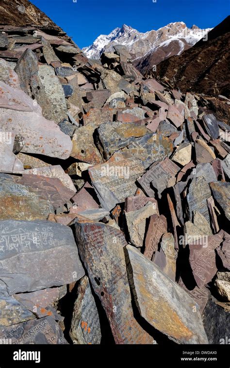 Mani wall in the Manaslu region of Nepal Stock Photo - Alamy