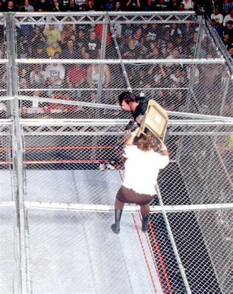 PHOTOS: Mankind And Undertaker's Epic 1998 Hell In A Cell Match