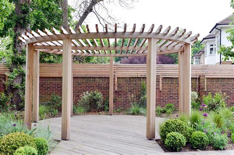 Circular wood pergola standing on circular deck Gazebo, Pergola Carport ...