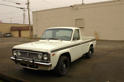 OLD PARKED CARS.: 1974 Mazda REPU.