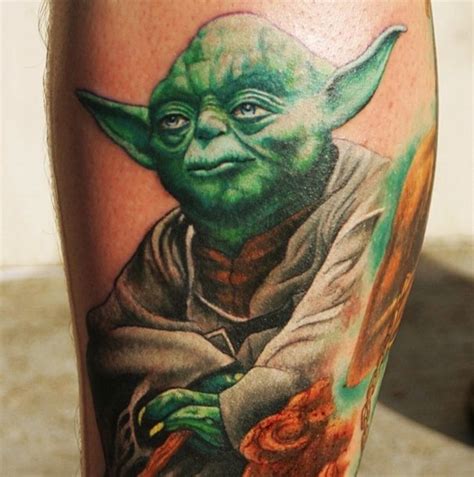 Big very detailed colorful master Yoda tattoo on leg - Tattooimages.biz