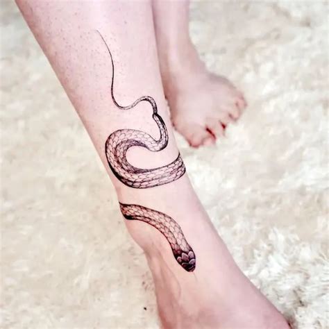 Details more than 79 ankle snake tattoo best - in.cdgdbentre