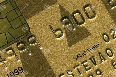 A gold credit card stock photo. Image of business, exchange - 5253796