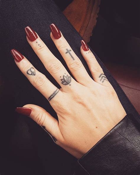 33 Small & Meaningful Finger Tattoos Ideas | Small finger tattoos ...