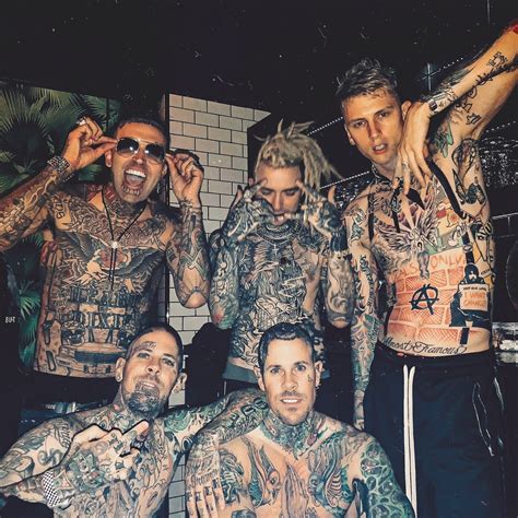 Behind all those tattoos you can actually see Yelawolf and MGK : r/Eminem