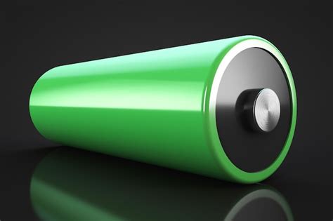 Premium Photo | Green battery cell on a black background