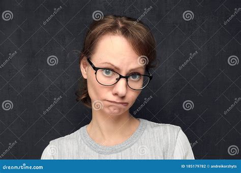 Portrait of Upset and Funny Girl Pouting and Biting Lips Stock Photo ...