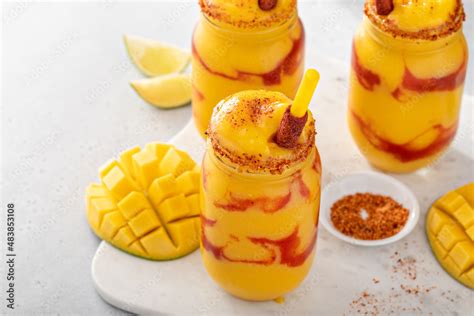 Mangonada mexican mango smoothie with chamoy sauce and lime seasoning ...