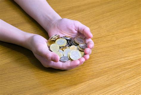 Handful of coins stock image. Image of investment, hand - 110007953