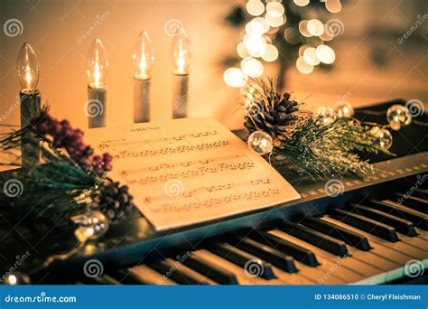 Keyboard With Instrumental Sheet Music And Soft Lights For Christmas ...