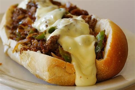 Slow Cooker Philly Cheese Steak Sandwiches - The Cooking Mom