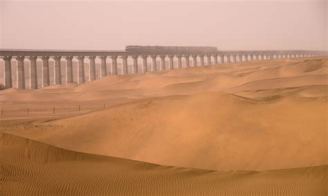 China to complete world’s first railway loop around a desert in ...