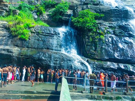 bathing view of kuttalam falls | TrampTraveller