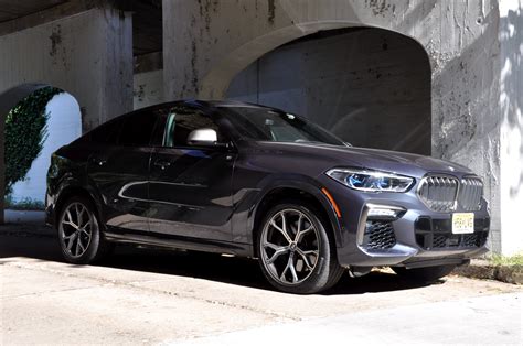 BMW X6 M50i Review: Part Crossover, Part Sports Sedan & a Dose of Brute ...