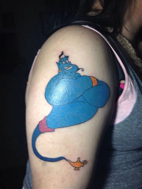 Disney tattoo Aladdin genie | Disney tattoos, Lamp tattoo, Genie tattoo