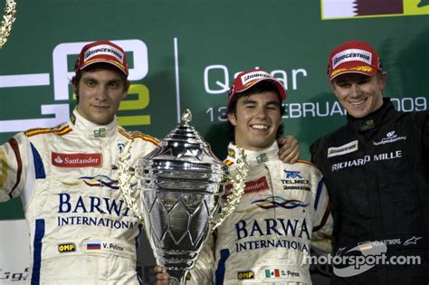 Podium: winner Sergio Perez, second place Vitaly Petrov, third place ...