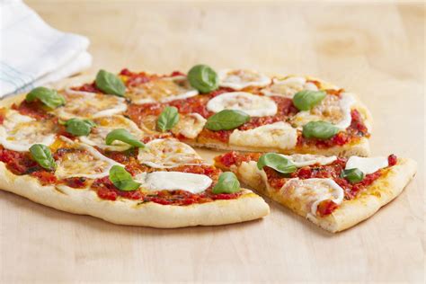 Pizza with tomato and mozzarella - FreshMAG