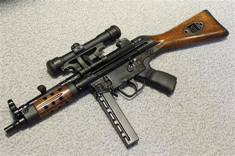 H&K MP5 9mm in polished wood Military Weapons, Weapons Guns, Guns And ...