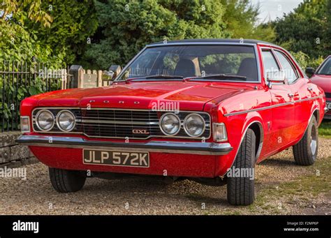 A red 1972 Ford Cortina Mk3 GXL four door Stock Photo: 87737630 - Alamy