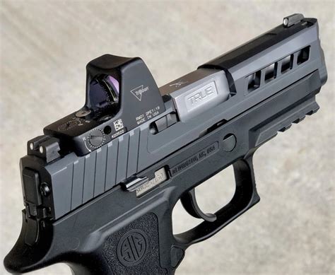 TRUE PRECISION SHOWS OFF NEW SIG P320 COMPACT M18 AXIOM SLIDES ...