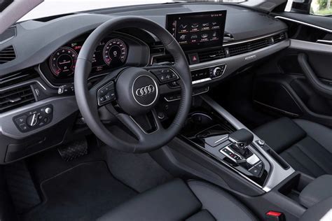 The interior of the latest 2020 Audi A4 - Changing Lanes